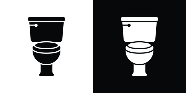 Black and white toilet side by side bathroom plumbing