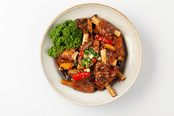 돼지고기의 갈비의 등 쪽에 붙어 있는 부분. 또는 등에 붙은 갈비. The part of pork ribs attached to the back. Or ribs attached to the back.  © jinho Park