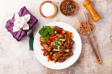 돼지고기의 갈비의 등 쪽에 붙어 있는 부분. 또는 등에 붙은 갈비. The part of pork ribs attached to the back. Or ribs attached to the back.  © jinho Park