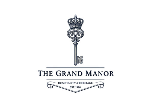 Elegant logo for The Grand Manor featuring a crowned antique key, symbolizing hospitality, heritage, and luxury, with decorative text and scroll.
