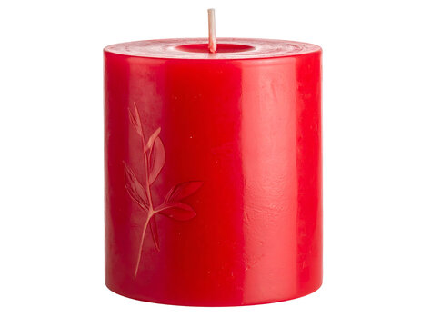 A vibrant red pillar candle with a delicate leaf embossed on its surface