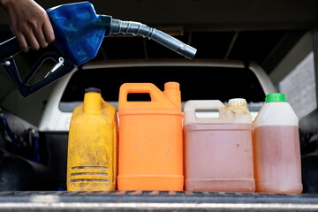 filling the car engine © K.Pornsatid