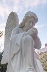 Obraz premium white angel statue praying at St. lawrence's church in macau