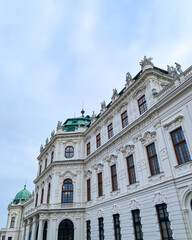 Fototapeta premium The Upper Belvedere Palace and its garden on a beautiful winter Christmas day in Vienna, Austria 