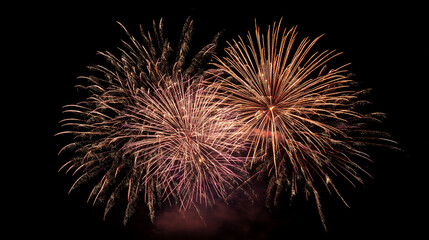 Obraz premium Spectacular golden fireworks burst vibrantly in the night sky.