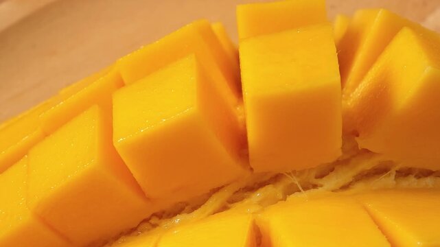 Close-up video of a slice ripe mango	
