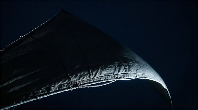Lateen Sail Texture in Wind with Dramatic Low Key Lighting at Night