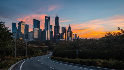 Fototapeta premium Contemporary urban skyline during sunset with unobstructed road perspective.