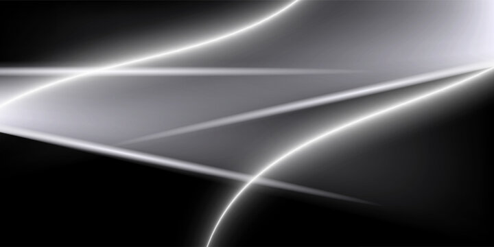 Abstract light streaks on a dark backdrop creating a dynamic, energetic mood.