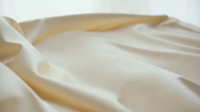 Soft flow fabric in ivory color with smooth texture background  