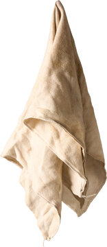 used off-white cotton rag isolated white background, coarse fabric material with stained frayed edges, draped folds side view