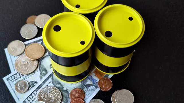 A barrel of oil against a backdrop of dollars as a concept for the global oil crisis and rising prices. A barrel of oil and dollars as a background for your design