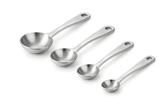 Four Stainless Steel Measuring Spoons Arranged in Descending Size on White Background