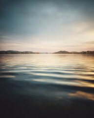 Fototapeta premium Calm Lake Surface Reflecting the Sky