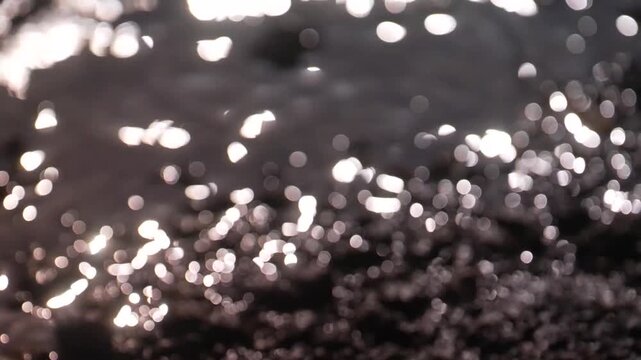 Abstract defocused light bokeh on ocean Kenya East Africa cinematic background shot