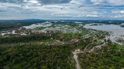 Khone Phapheng Waterfall, the largest waterfall on the Mekong River, features powerful multi-tiered cascades rushing over massive rock formations, creating one of the most dramatic natural © Narong Niemhom