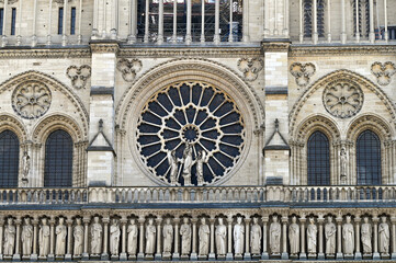 Fototapeta premium The rose window on the west facade of Notre Dame Cathedral in Paris, France.
