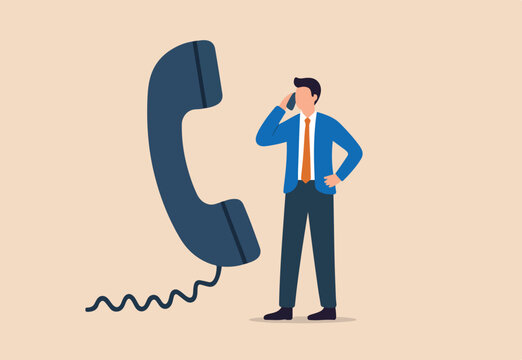Job interview via phone call or conference meeting on telephone concept, smart confidence businessman job candidate answer interview questions with big telephone from recruiter or employer.