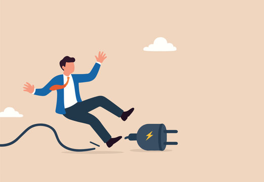 Failure or mistake, accident or surprise problem that impact business concept, clumsy businessman stumble with power cable electric plug falling on the floor.