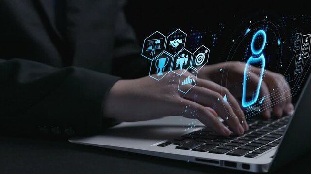 A professional individual engages in data analysis while typing on a laptop, surrounded by vibrant digital icons symbolizing technology and business concepts. Qubit