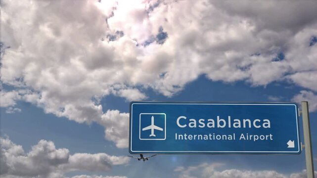 Casablanca Morocco Jet plane landing. City arrival with airport direction sign. Travel, business, tourism and airplane transport concept.