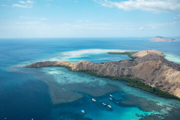Aerial view of Pulau Siaba Besar island on a sunny tropical day © Hector