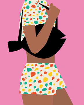 Woman in beachwear with fish-shaped handbag