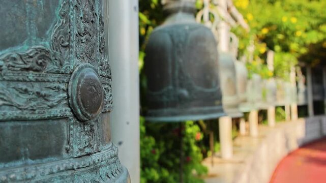 Golden Mount Temple Bronze Bells Close Up Along Curved Garden Path