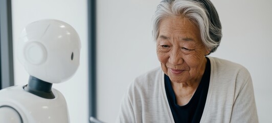 Older Woman Interacting with Robot
