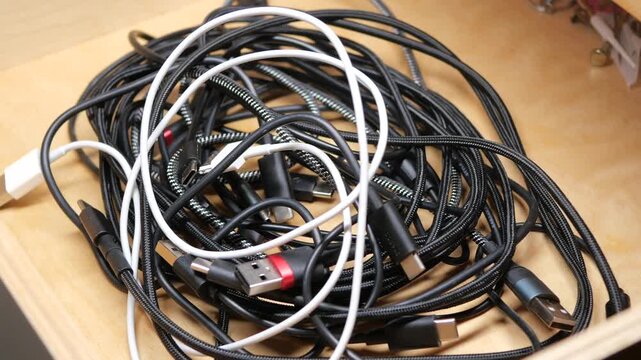Organizing messy cables in a drawer