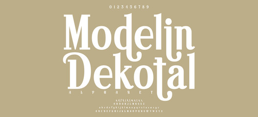 Elegant wedding alphabet letters font with tails. Typography oriental luxury classic serif fonts and number decorative vintage retro for logo branding. vector illustration © Custom Designs