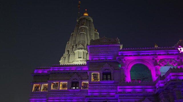 Prem Mandir temple in Vrindavan, Uttar Pradesh beautifully illuminated at night. Famous Hindu temple dedicated to Radha Krishna, showcasing spiritual devotion, architecture, and religious tourism.