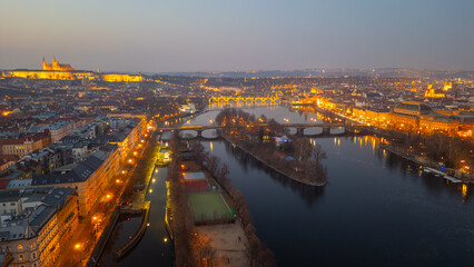 Fototapeta premium Sunset aerial view of Hradcany district and strelecky island in