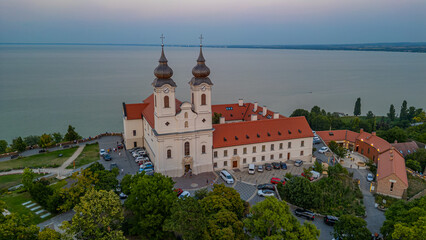 Obraz premium Sunset view of the Tihany Benedictine Abbey beside Balaton lake