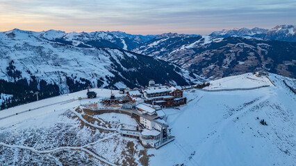 Fototapeta premium Sunset view of Hotel at Schmittenhohe ski resort in Austria