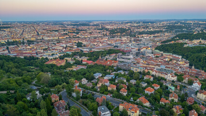Fototapeta premium Sunset panorama view of Smichov part of Prague from Petrin hill,