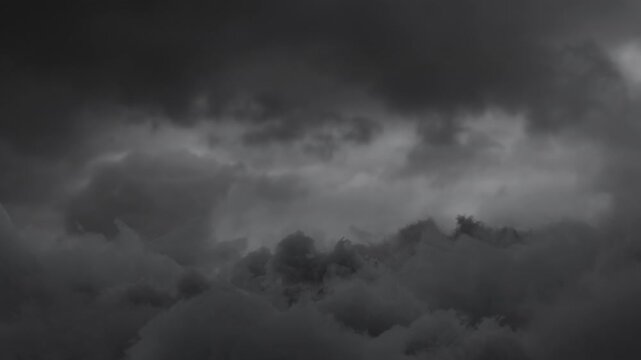 3D Animation of flying over grey fluffy clouds 