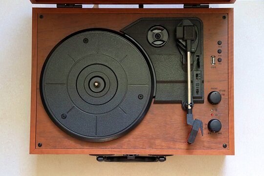 Vinyl record player. Wooden turntable. Vintage, retro concept. 