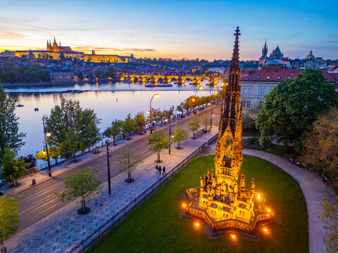 Sunset view of Kranner well and Hradcany district in Prague, Cze