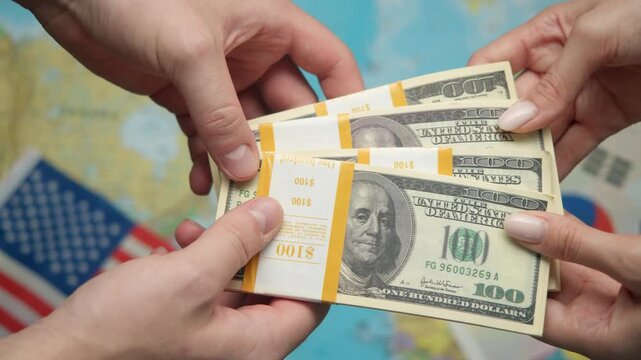 American tech investor passes stack of dollars to South Korean representative against world map with US and South Korean flags for semiconductor collaboration.
