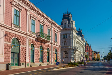 Fototapeta premium Sunrise view of historical houses in Szeged, Hungary