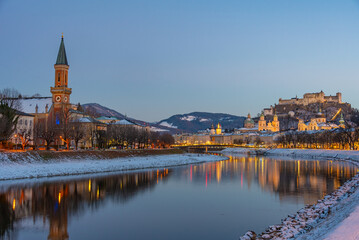 Fototapeta premium Sunset view of Hohensalzburg fortress overlooking Salzach river