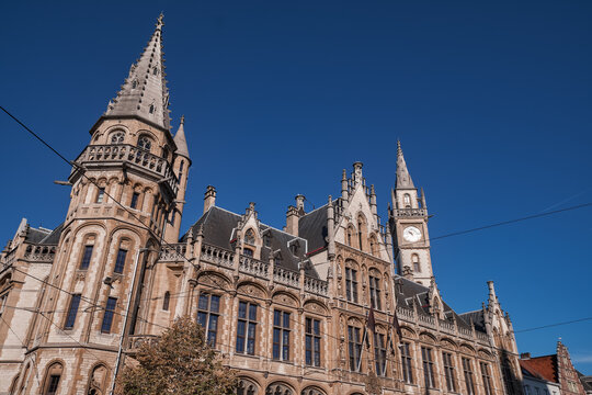 Gothic Revival architecture of the Old Post Office and clock tower - Ghent, Belgium