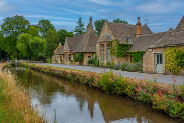 Fototapeta premium Historical houses of the Cotswolds region at Lower Slaughter, En