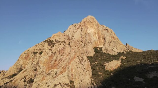 Drone Shot of Pe&ntilde;a de Bernal Giant Monolith in Mexico Landscape