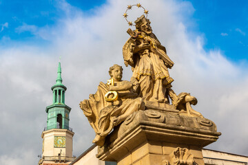 Fototapeta premium Statue of St. John of Nepomuk and Town hall in Poznan
