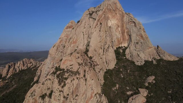 Drone Shot of Pe&ntilde;a de Bernal Giant Monolith in Mexico Landscape