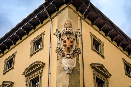 Medici coat of arms with papal tiara and a fleur-de-lis in Florence, Italy