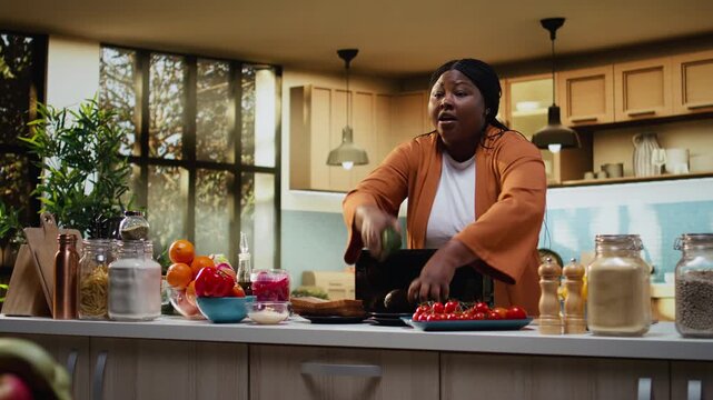 Content creator, filming food vlog, avocado on toast recipe, toaster on counter, preparing bread and spread in the kitchen. Influencer demonstrating meal prep and cooking process, dish video.