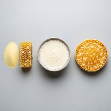 Detailed view of Baghrir ingredients: semolina flour, fresh honeycomb, bubbly fermented batter, and a thousand-hole pancake.